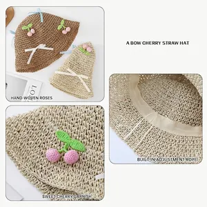 Foldable summer straw hat for girls with bow and crochet cherries detail