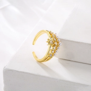 Elegant 18K gold-plated open ring featuring white pearls and star pattern zircon crown design