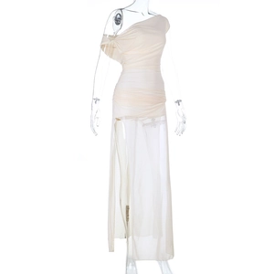 Detail of cream one-shoulder dress showing ruched chiffon fabric and high slit design