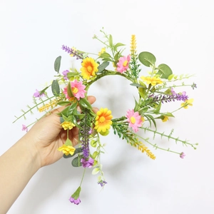 Vibrant daisy candle ring wreath with colorful faux lavender and lush green foliage decor