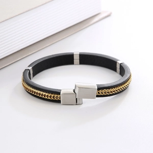Minimalist black matte leather bracelet with golden braided chain and silver metal clasp