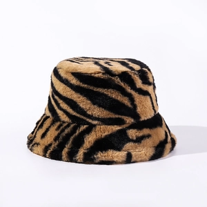 Close-up of thick zebra pattern faux fur bucket hat showing plush texture and stripes