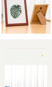 Detail of the sturdy back support for vertical desktop display on natural wood frame
