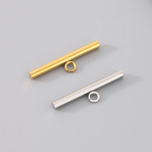 Macro detail of gold and silver plated stainless steel OT toggle clasps for DIY jewelry