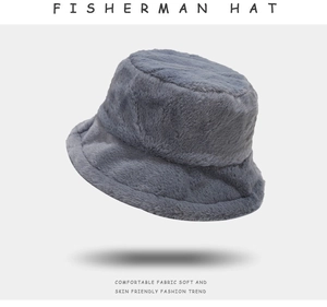 Detail of soft gray plush fisherman hat texture with clean minimalist white background