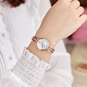 Elegant rose gold round quartz watch for women with diamond markers and bracelet strap