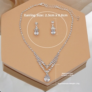 Detail view of cz stone bridal jewelry set showing 2.5cm earrings and 3.3cm necklace pendant