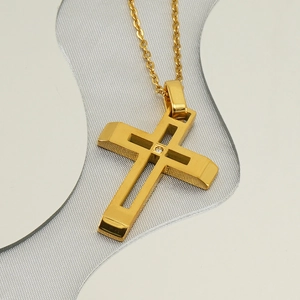 Detail of 18K gold hollow cross pendant with center diamond on a delicate O-chain