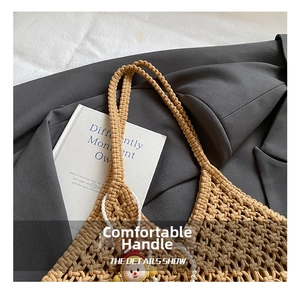 Detail of handwoven camel cotton rope tote bag featuring pearl chain and cute charm accessory