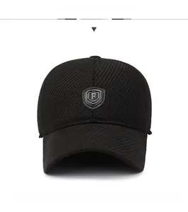 Front view of black winter baseball cap with plush lining and metal F shield logo