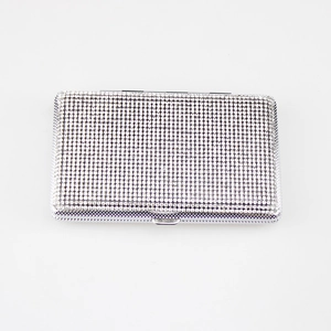 Top view of rectangular silver metal case with dense sparkling crystal rhinestones
