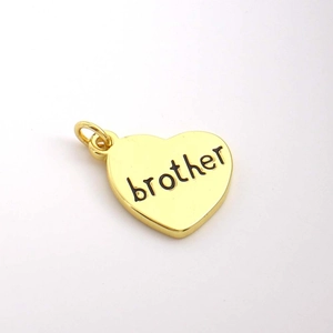 Golden heart-shaped pendant with brother engraving on a clean white background