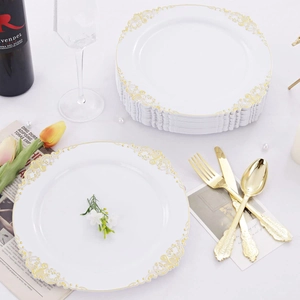 Detailed set of white disposable plates with gold dragon relief and matching cutlery