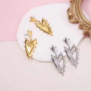 French vintage heart shaped drop earrings in gold and silver finish on stone base