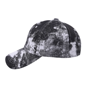 Classic black and white tie-dye baseball cap with a pre-curved brim and six-panel crown