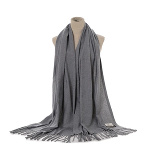Solid color cashmere feel winter warm scarf, detailed view of the cozy grey texture.