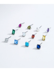 Matrix display of S925 sterling silver studs with colorful birthstones in diverse shapes