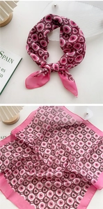 Pink heart patterned cotton-linen scarf detail showing tied styling and flat pattern layout