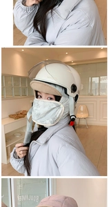 Detail of adjustable transparent anti-fog goggles and plush warm lining on white safety helmet