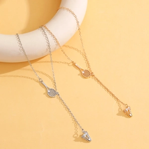 Minimalist badminton racket tassel necklace in gold and silver with zircon accents