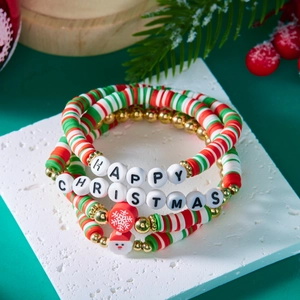 Detail of Christmas beaded bracelet set with Santa charm and Happy Christmas letter beads