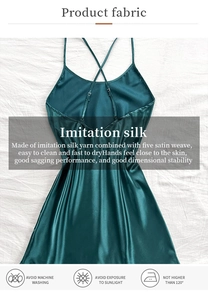 Detail of cross straps and metal buckles on dark green silk-like satin nightgown