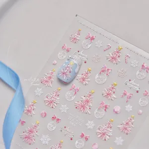 Detailed 5D relief Christmas nail stickers with pink trees and iridescent snowflake decals