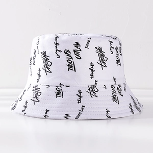 White cotton bucket hat with black graffiti print and street style lettering design