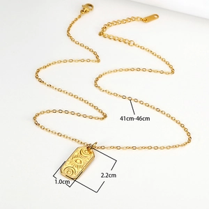 Gold plated celestial rectangular pendant necklace with sun moon and eye engravings