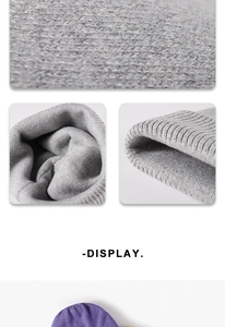 Macro detail of thick ribbed knit texture and stitching on winter beanie hat