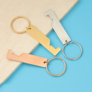 Three-color house-shaped stainless steel keychains in gold, silver, and rose gold finishes