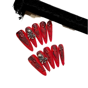Gothic red and black stiletto press-on nails with 3D skull and rose metal charms