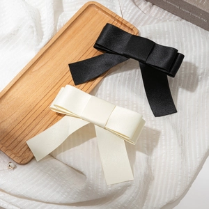 Elegant satin bow hair clips in black and cream beige, French style hair accessories
