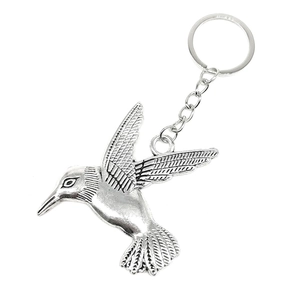 Silver hummingbird pendant keychain in vintage alloy style for travel souvenir gift