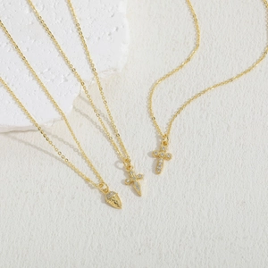 Three dainty 14K gold plated necklaces featuring ice cream cross and cone zircon pendants