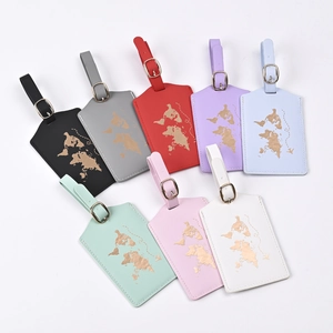 Set of eight colorful PU leather luggage tags featuring golden world map foil printing