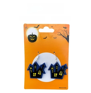 Detail of dark blue haunted house earrings for Halloween party on decorative card