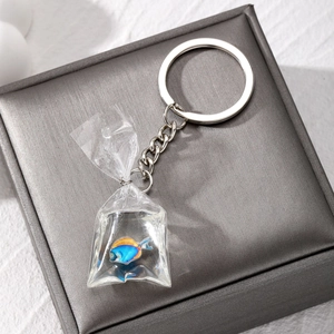 Creative resin tropical fish bag keychain with transparent water bag charm and silver ring