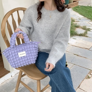 Purple bubble texture canvas handbag with minimalist puff design for casual outdoor use