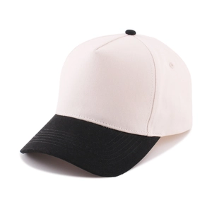 Detail of five-panel cotton baseball cap with contrast brim and breathable eyelets