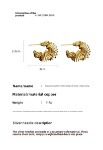 Detail view of twisted gold-plated C-shaped earrings with 925 silver needles and size specs