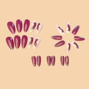 Long stiletto press-on nails featuring purple glitter and hand-painted butterfly art