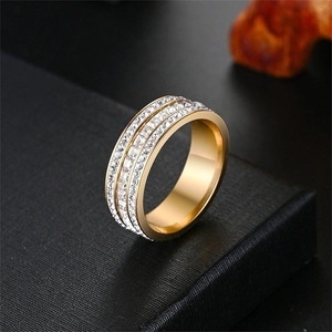 Luxury gold titanium steel ring featuring three rows of sparkling square and round cut zircons