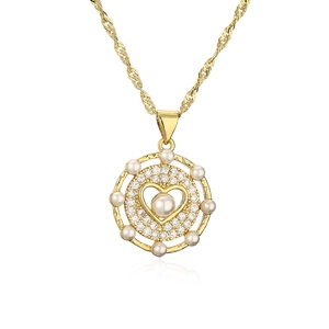 Elegant gold heart pendant necklace featuring large central pearl and sparkling zircon accents