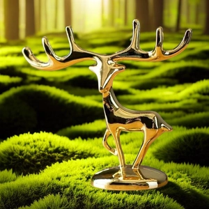 Golden luxury zinc alloy deer figurine storage holder standing on green moss forest background