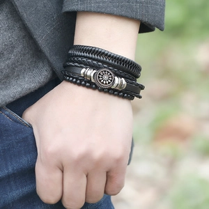 Men's 4-piece set of multilayer braided black leather bracelets with dreamcatcher metal charm