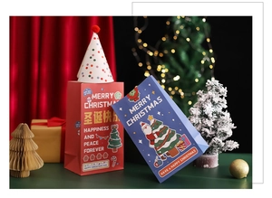 Detailed view of red and blue Christmas paper gift bags with festive holiday patterns