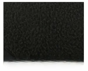 Close-up of thick black fleece fabric detail for warm winter baseball cap comfort