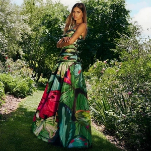 Tropical leaf and floral print strapless maxi dress featuring vibrant pink and green patterns