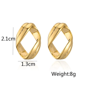 Detailed view of 18K gold irregular twisted earrings showing size 2.1cm and 8g weight
